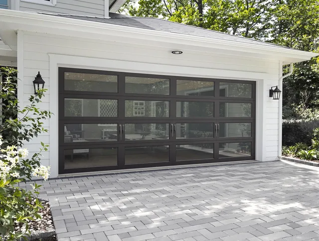 Seven Hills Garage Door Repair design specialist presenting custom garage door options to Seven Hills homeowner