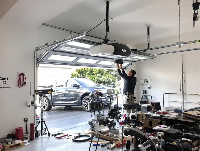 Seven Hills Garage Door Repair specialist installing smart garage door opener system in Seven Hills home