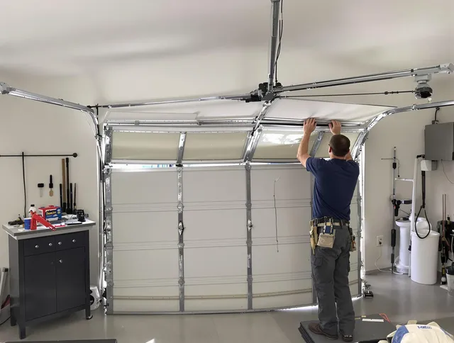 Seven Hills Garage Door Repair specialist performing precise section replacement on Seven Hills garage door