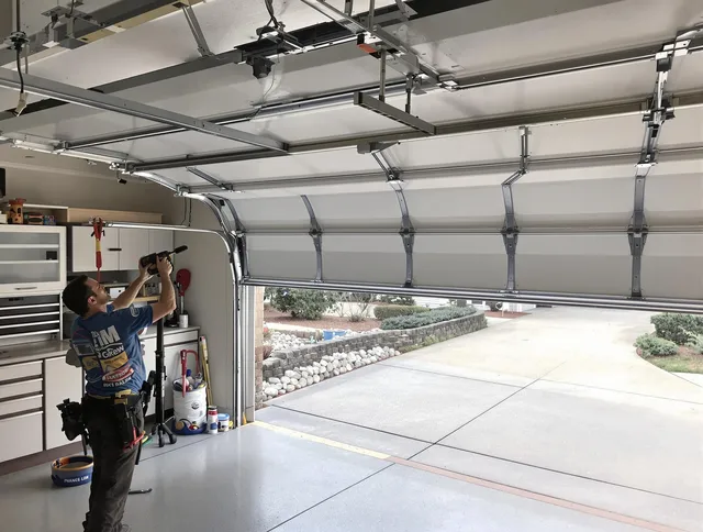Garage door track repair service by Seven Hills Garage Door Repair in Seven Hills